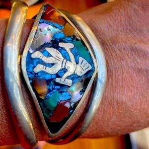 Hand crafted 925 silver cuffed with Aztec inspired motif, celebrating diversity.